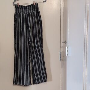 GUC women's Bilabong black/white striped pants, size L